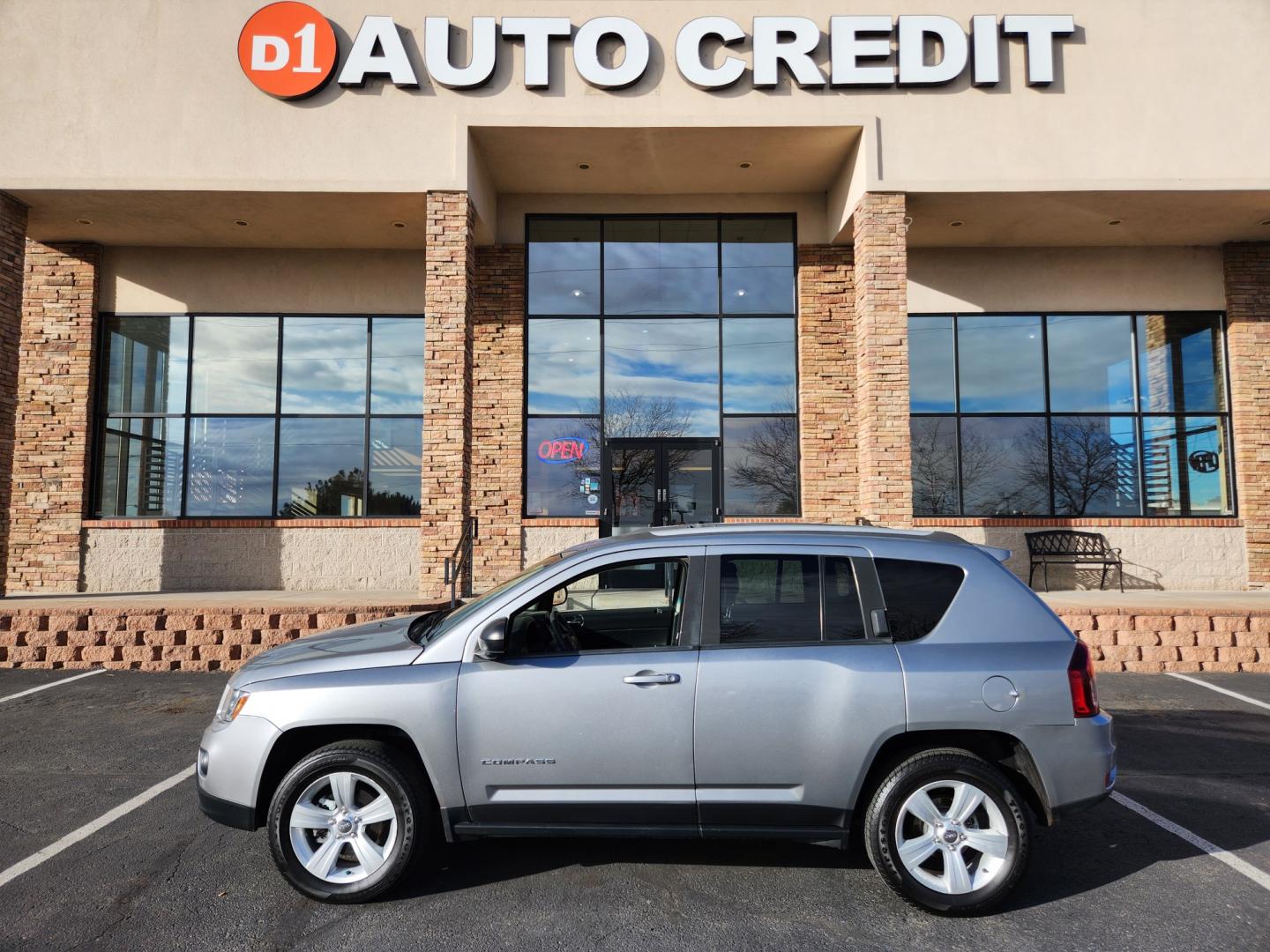 2015 Billet Silver Metallic Clearcoat /Dark Slate Gray Jeep Compass Sport (1C4NJDBB9FD) with an 2.4L I4 DOHC 16V Dual VVT engine, Automatic transmission, located at 8595 Washington St., Thornton, CO, 80229, (303) 287-5511, 39.852348, -104.978447 - 2015 Jeep Compass<br><br>D1 Auto NEVER charges dealer fees! All cars have clean titles and have been inspected for mechanical issues. We have financing for everyone. Good credit, bad credit, first time buyers.<br><br>Please call Lakewood Location 303-274-7692 or Thornton 303-287-5511 to schedule a t - Photo#0